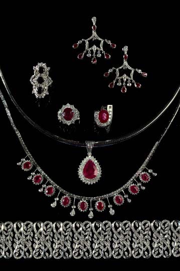 Appraisal: Fourteen-Karat White Gold Ruby and Diamond Pendant on an Omega