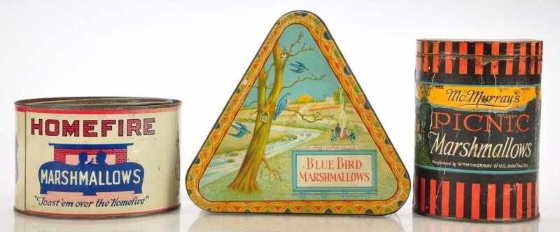 Appraisal: Lot of Marshmallow Tins Description Lot Includes triangular shaped Canadian