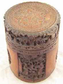 Appraisal: A Chinese carved bamboo tea caddy with metal liner cm