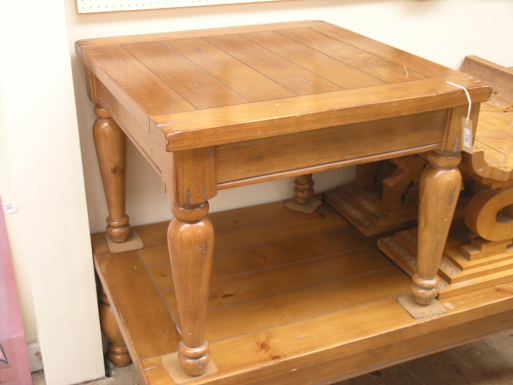 Appraisal: A varnished pine coffee table on turned legs ft in