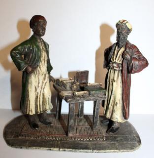 Appraisal: Cold painted bronze depicting scholars Cold painted bronze depicting scholars