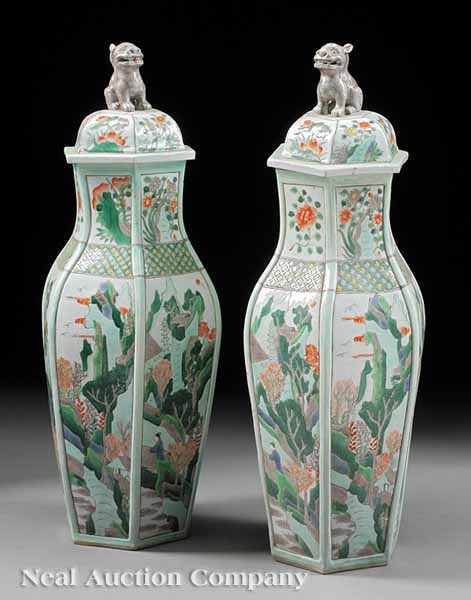 Appraisal: A Pair of Chinese Famille Verte Multi-Faceted Covered Vases each