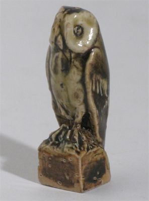 Appraisal: A miniature stoneware owl possibly James Stiff Son Lambeth glazed