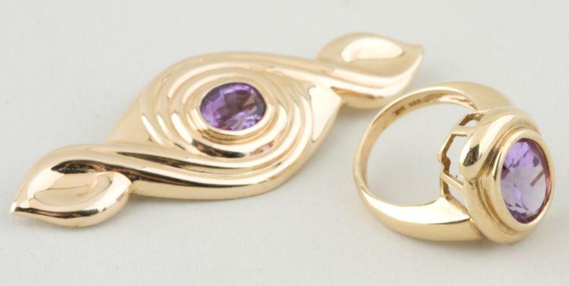 Appraisal: KT Yellow Gold and Amethyst Ring and Brooch oval amethyst