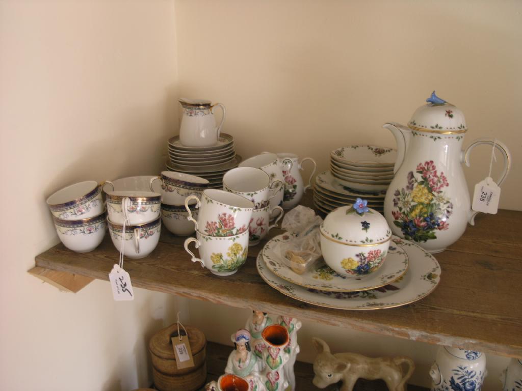 Appraisal: A German coffee set brightly floral printed twenty-three pieces including