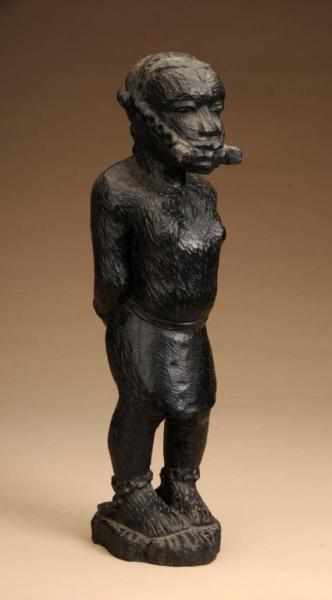 Appraisal: African Carving of a Slave Description Made of Iron wood