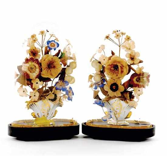 Appraisal: Pair Victorian floral arrangements under glass dome probably English th