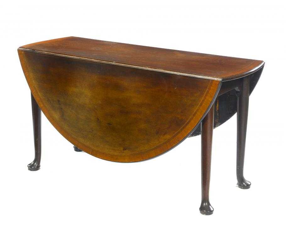 Appraisal: A GEORGE III MAHOGANY GATE LEG TABLE the oval top