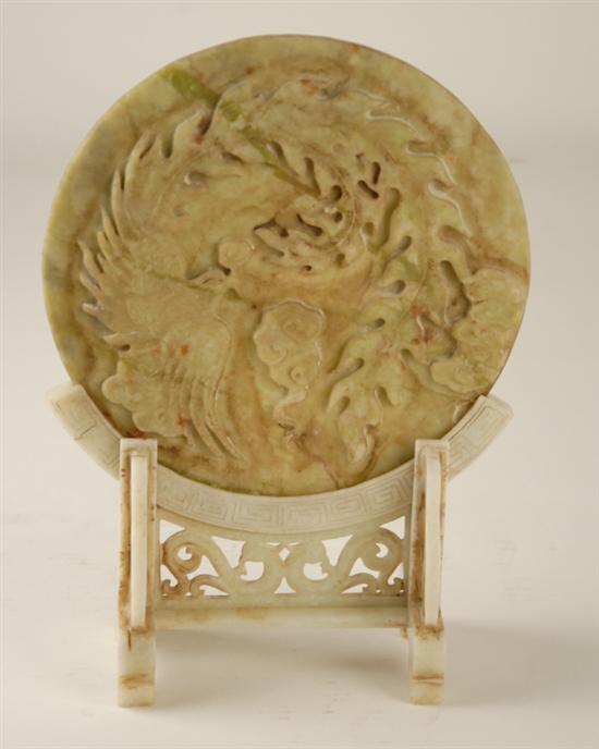 Appraisal: A Relief Carved Chinese Hardstone Disc possibly jade with a