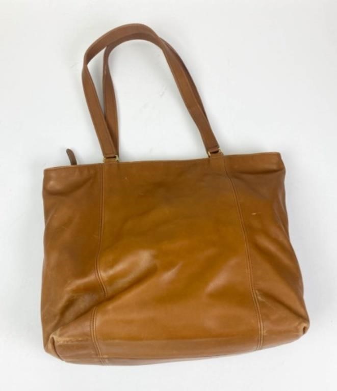 Appraisal: Coach leather tote with double shoulder straps zippered closure single