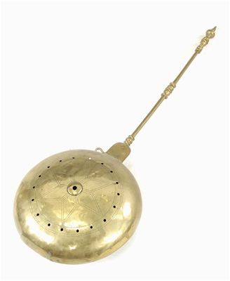 Appraisal: A Dutch brass warming pan with a turned handle with