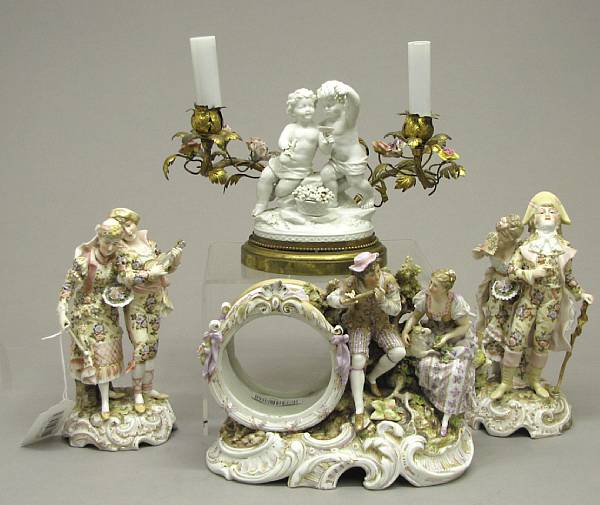 Appraisal: A Thuringian porcelain three piece garniture and a figural boudoir