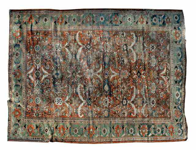 Appraisal: A PERSIAN MAHAL RUST GROUND CARPET with stylised foliate decoration