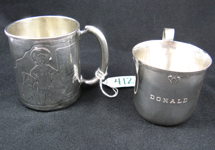 Appraisal: TWO CHILD'S STERLING SILVER DRINKING CUPS One engraved scene of