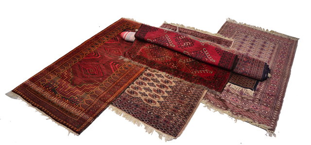 Appraisal: A COLLECTION OF SIX MIDDLE EASTERN PERSIAN DESIGN RUGS varying