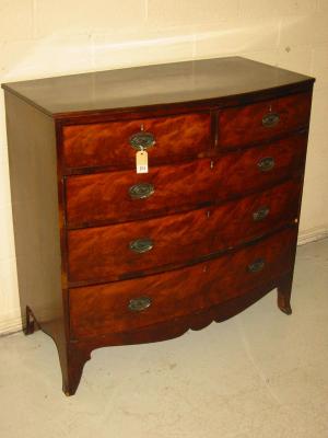 Appraisal: AN EARLY VICTORIAN MAHOGANY CHEST of bowed form the banded