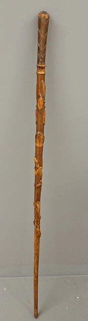 Appraisal: Walking stick finely carved with alligators snakes and an eagle