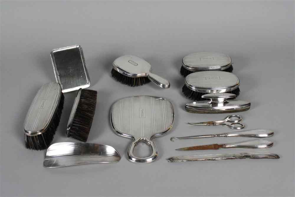 Appraisal: GORHAM SILVER BACKED GENTLEMAN'S DRESSER SET including four brushes hand