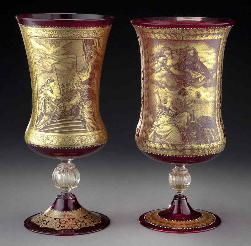 Appraisal: Venetian gilt cranberry glass vases each having one side gilt