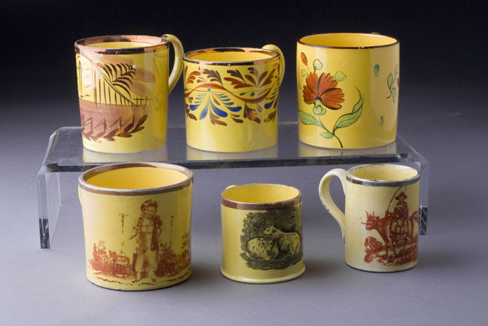 Appraisal: SIX ENGLISH YELLOW GLAZED TRANSFER PRINTED CHILDREN'S MUGS Depicting various