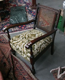 Appraisal: A pair of Edwardian maple and caned armchairs together with