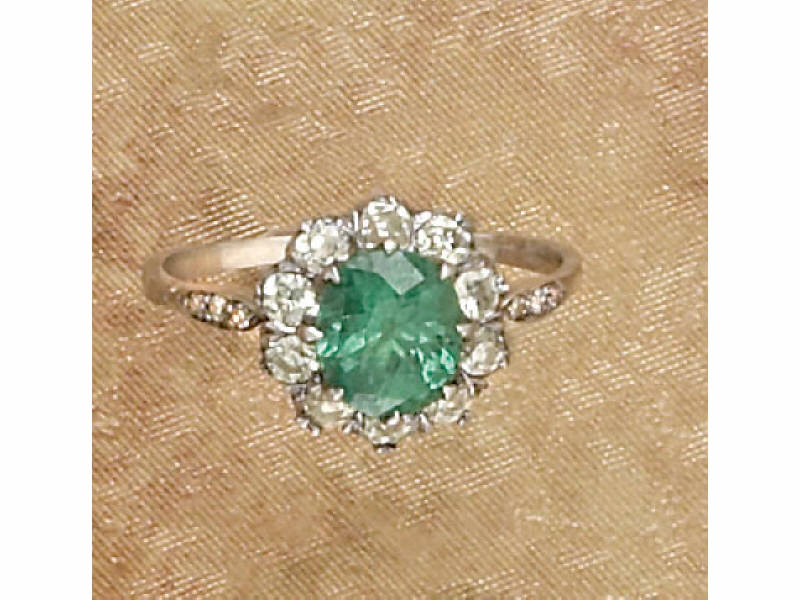 Appraisal: TSAVORITE AND DIAMOND RING k white gold ring set with