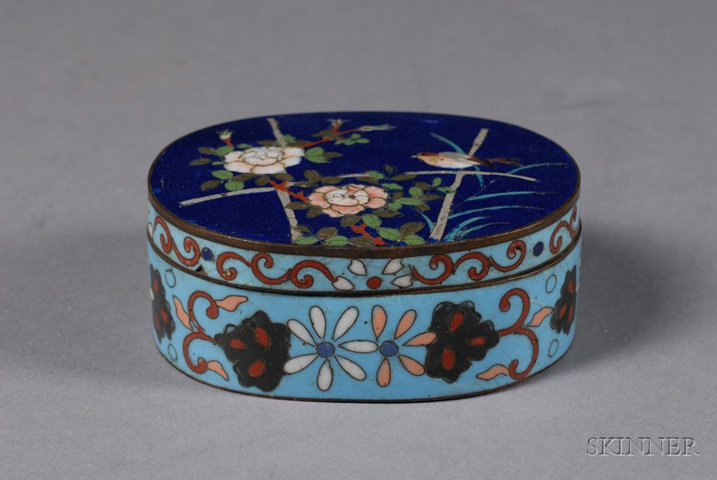 Appraisal: Oval Cloisonne Box Japan late th century midnight blue ground