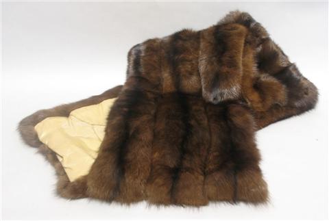 Appraisal: AN ATTRACTIVE MINK STOLE Fashioned in strips of rich brown