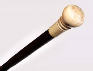 Appraisal: A TH CENTURY WALKING STICK WITH TURNED IVORY The tapering