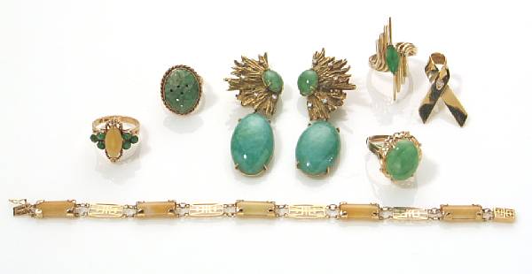 Appraisal: A collection of seven diamond jade stone and gold jewelry