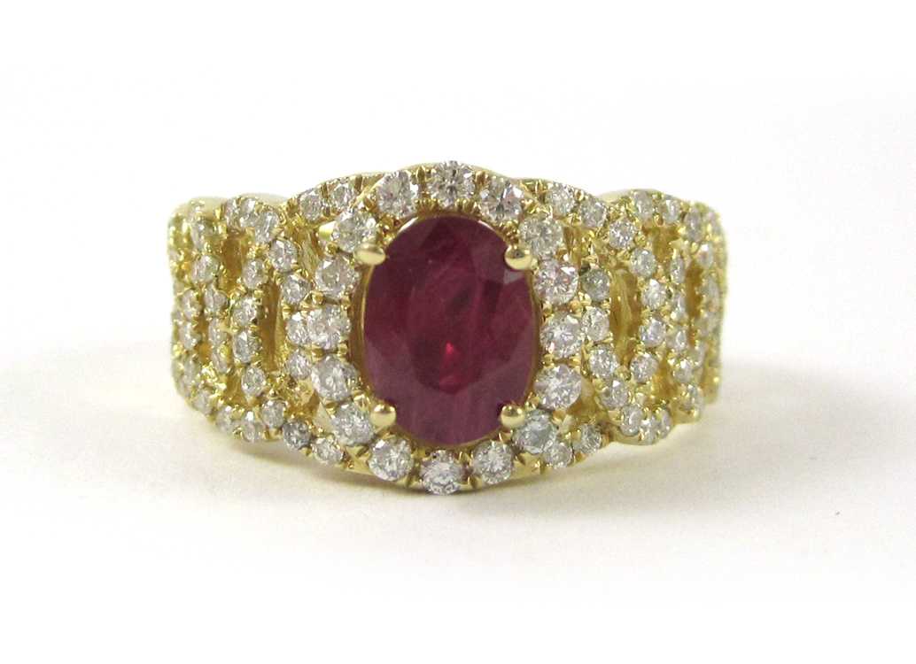 Appraisal: RUBY DIAMOND AND FOURTEEN KARAT GOLD RING with round-cut diamonds