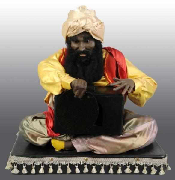 Appraisal: Swami Magician Electric Automaton Description s The Swami raises and