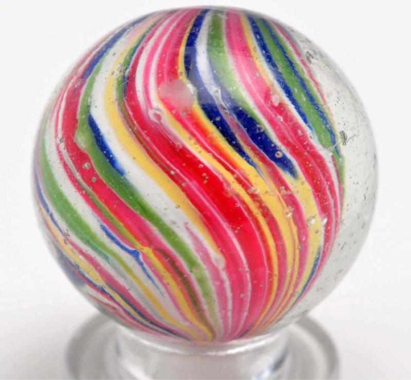 Appraisal: Onionskin Clown Marble Description Left twist onionskin with fabulous color