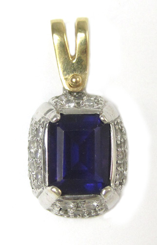 Appraisal: AMETHYST AND FOURTEEN KARAT GOLD PENDANT The white gold yellow