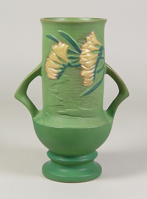 Appraisal: Roseville Freesia Vase Circa Yellow freesias on green ground Two