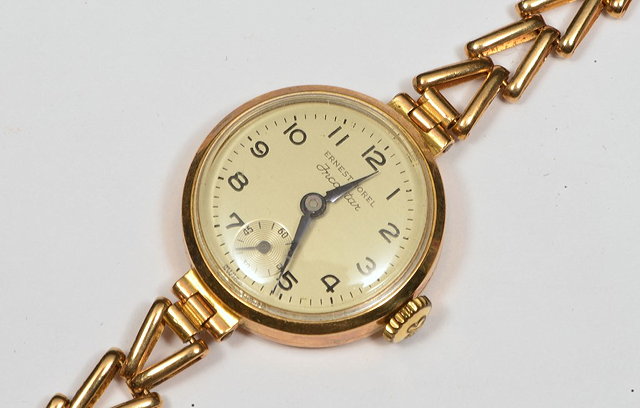 Appraisal: A CT GOLD LADIES WRIST WATCH by Ernest Borel with