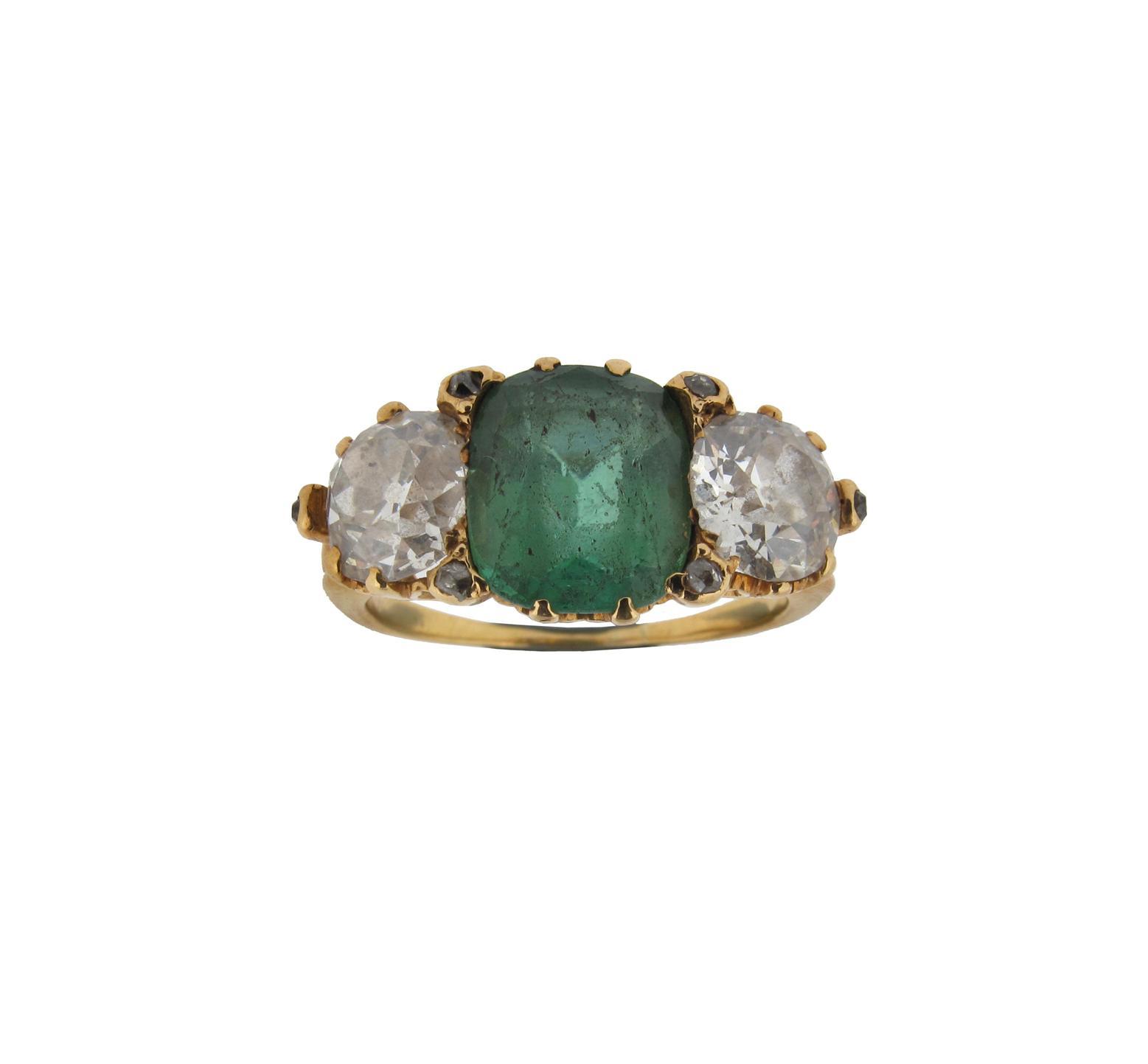 Appraisal: A green stone and diamond three stone ring