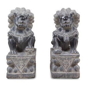 Appraisal: A Pair of Chinese Carved Stone Temple Lions th Century