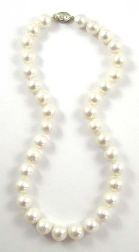 Appraisal: PRINCESS LENGTH PEARL NECKLACE strung with well matched white pearls