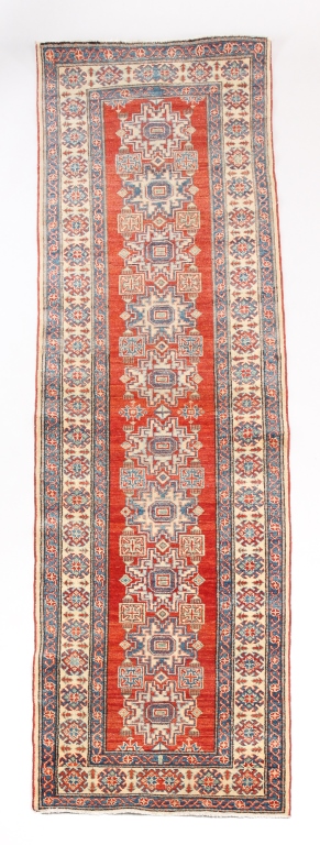 Appraisal: PAKISTAN KAZAK RUNNER Late th century Red ground with blue