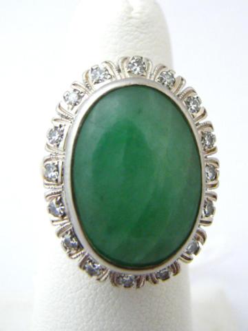 Appraisal: K yellow gold oval jade cabochon ring with diamond accents