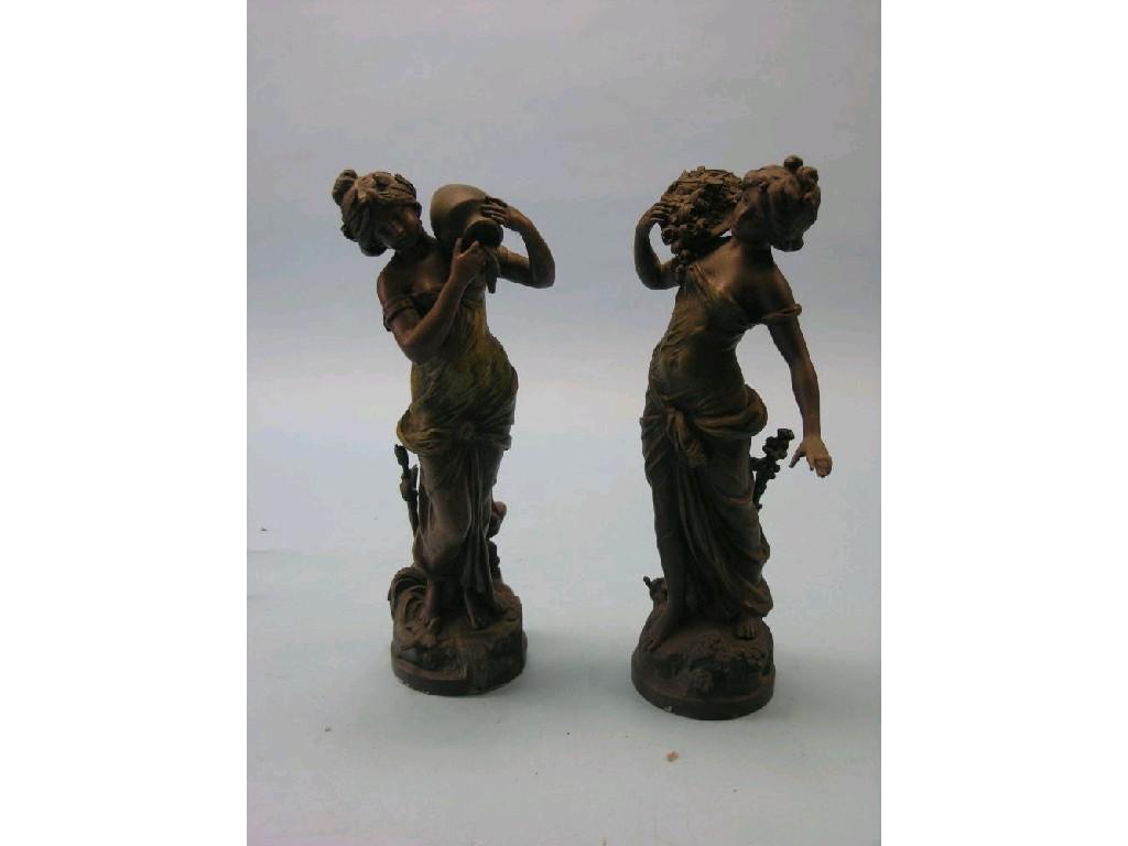 Appraisal: A pair of late th century patinated spelter statuettes each