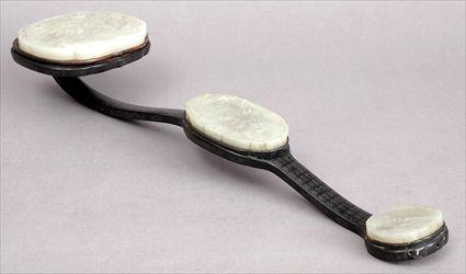 Appraisal: CHINESE CARVED JADE-MOUNTED AND PEWTER-INLAID EBONY JUI SCEPTER The oblong