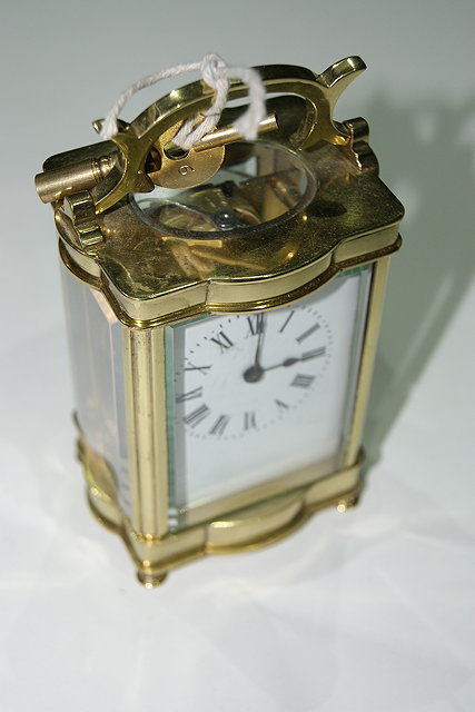 Appraisal: A BRASS CARRIAGE TIMEPIECE