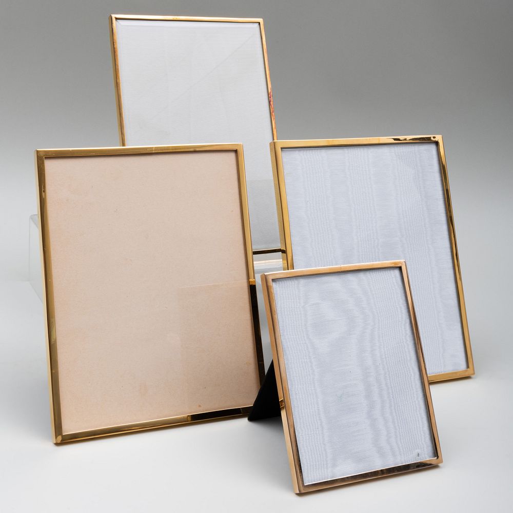 Appraisal: Four Jean Dinh Van Paris Silver-Gilt Picture Frames Each marked