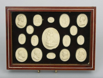 Appraisal: A Framed Set of Grand Tour Plaster Medallions A framed