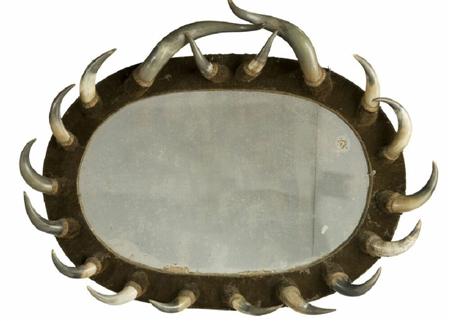 Appraisal: A th century horn encrusted wall mirror of elliptical form