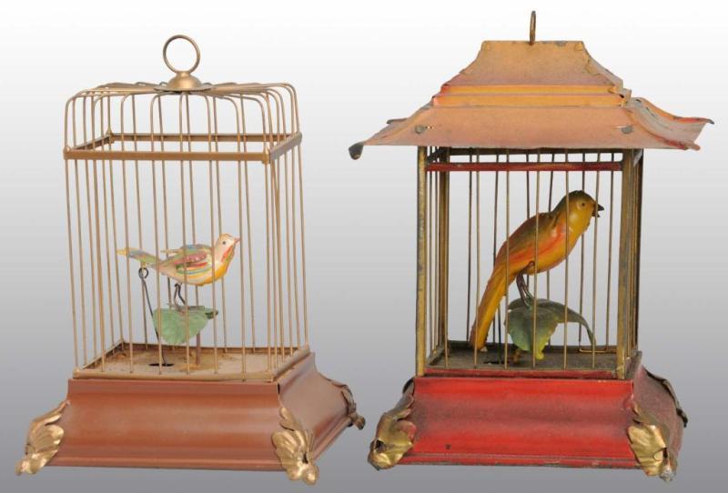 Appraisal: Lot of Hand-Painted Bird in Cage Wind-Up Toys Description German