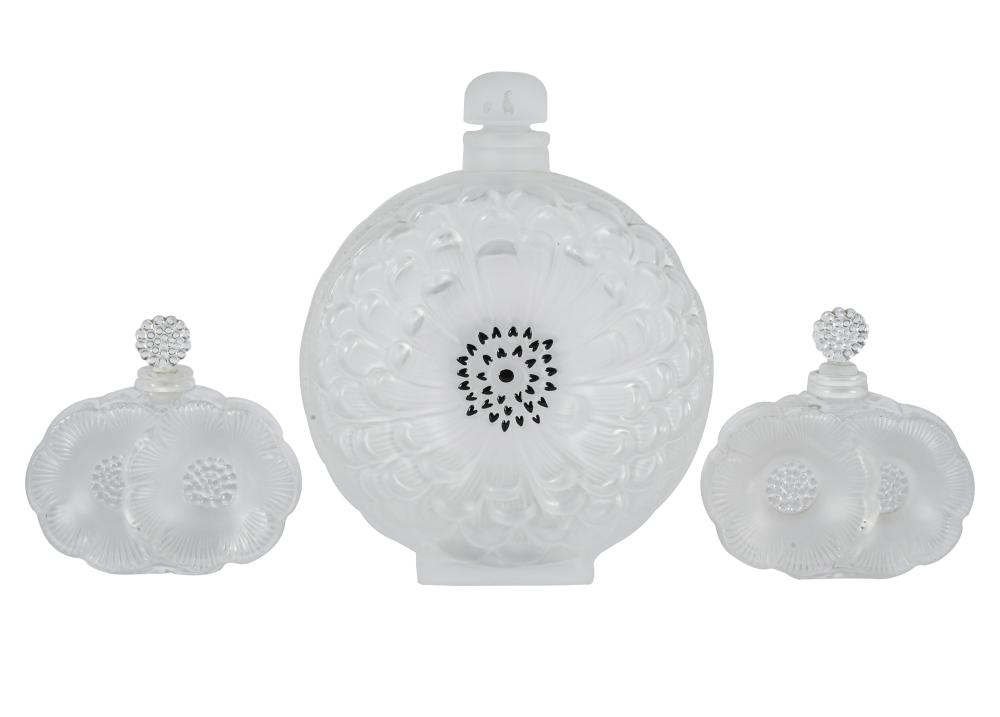 Appraisal: THREE LALIQUE ANEMONE GLASS PERFUME BOTTLESeach marked Lalique France Provenance