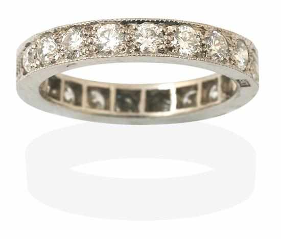 Appraisal: A FULL CIRCLE DIAMOND ETERNITY RING Comprising twenty round brilliant